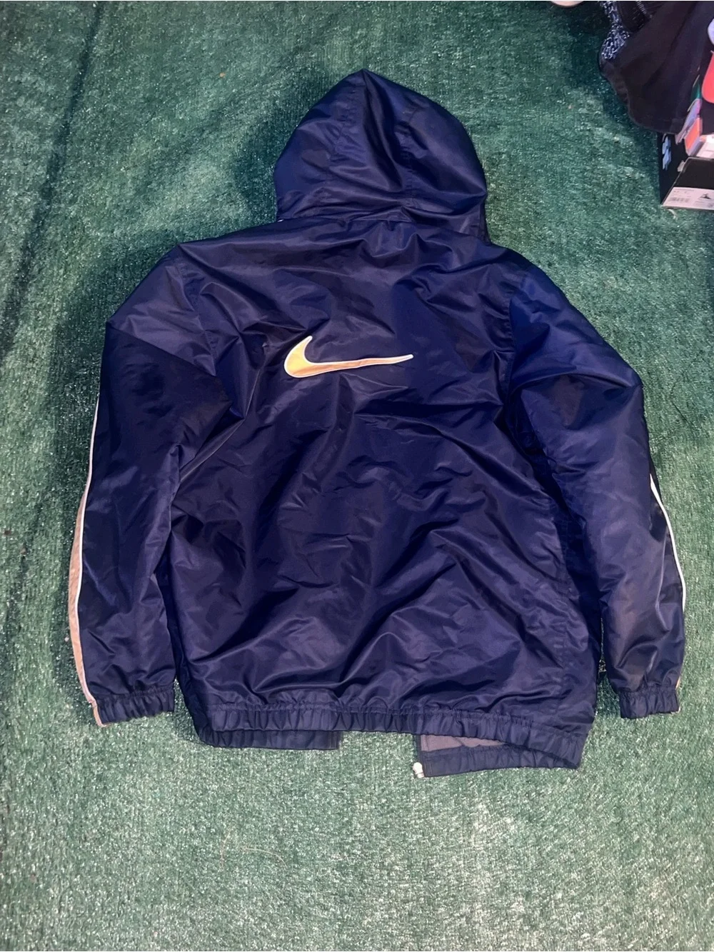 Nike Men’s Navy Windbreaker Jacket with Gold Stripe Accents